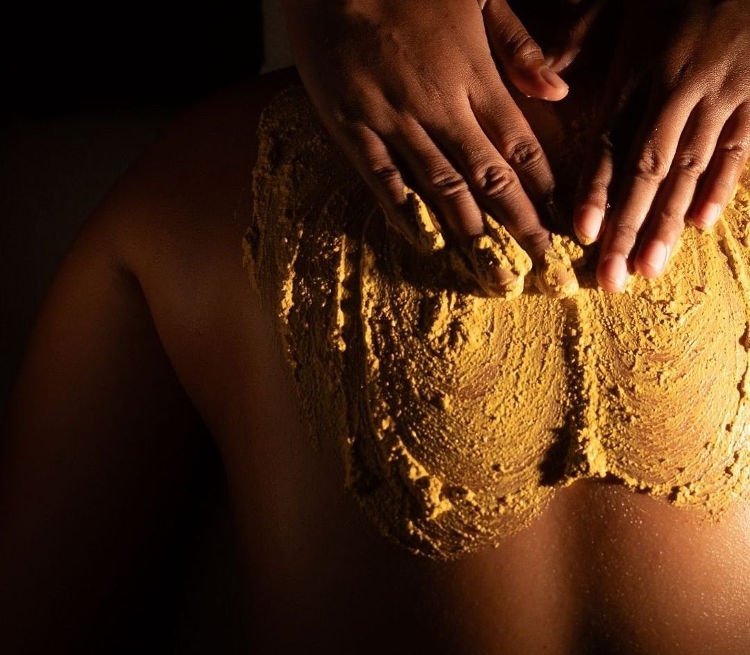 Turmeric body scrub massage treatment