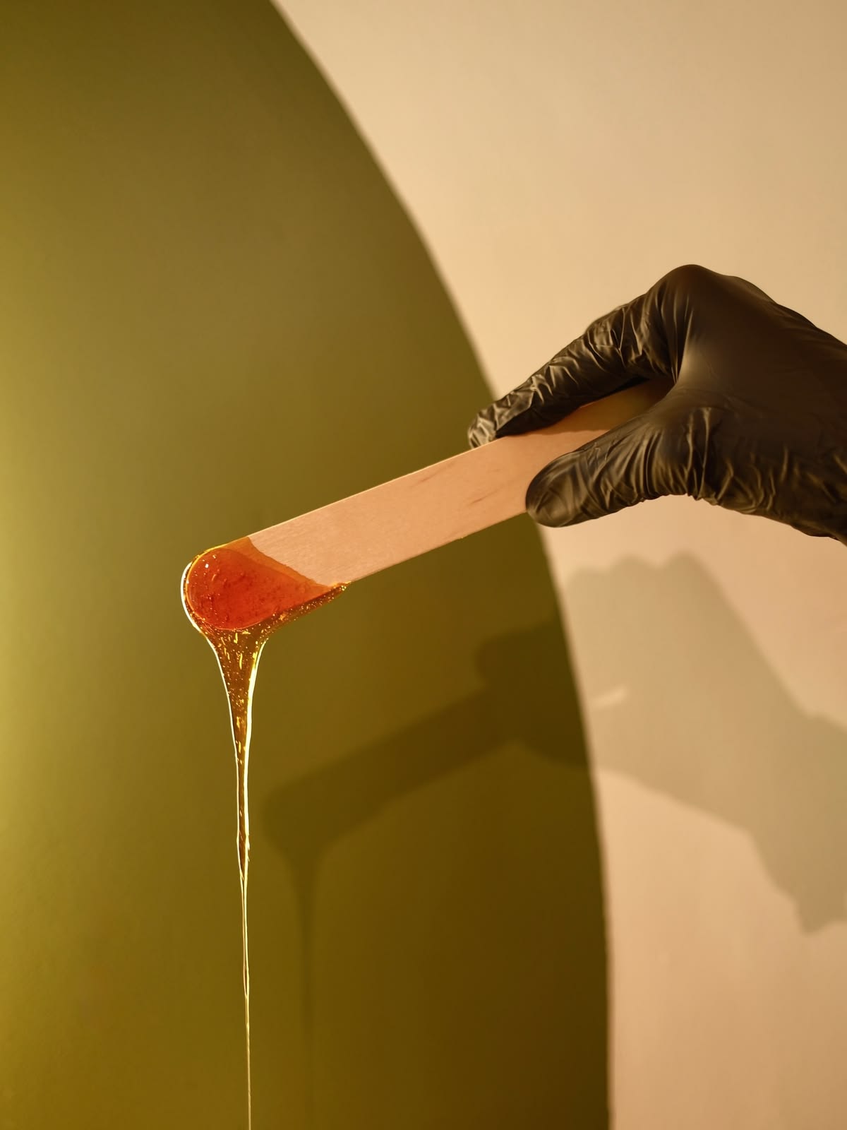 Sugar wax treatment paste on applicator stick